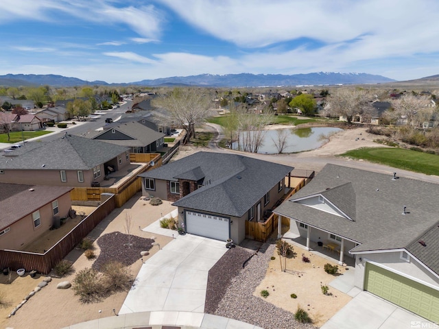 birds eye view of property featuring a mountain view