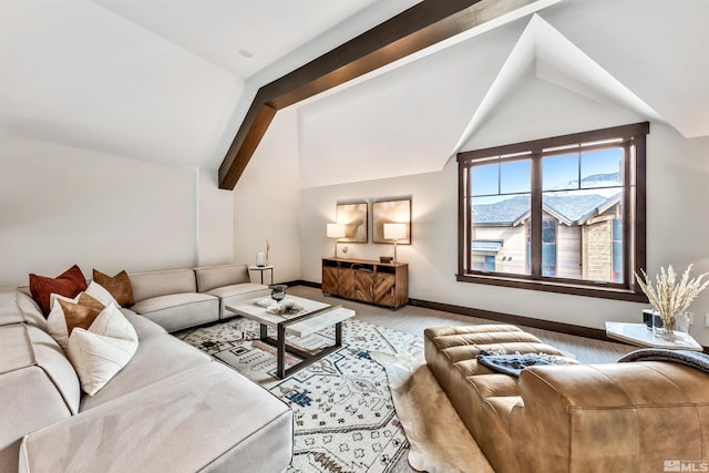 living room with lofted ceiling with beams and light carpet