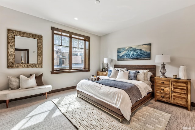 bedroom featuring light carpet