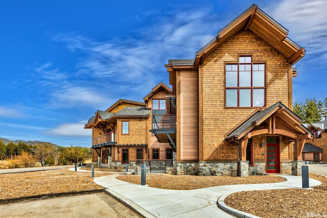 view of front of home with a balcony