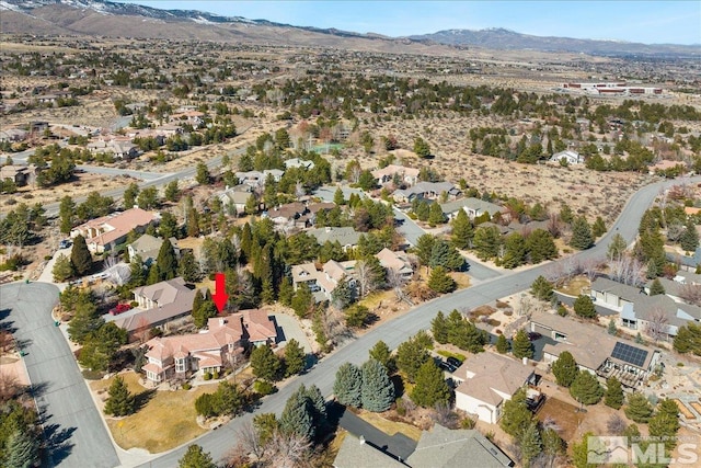 drone / aerial view featuring a mountain view