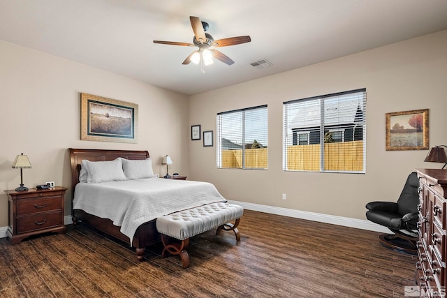 bedroom featuring dark hardwood / wood-style floors and ceiling fan