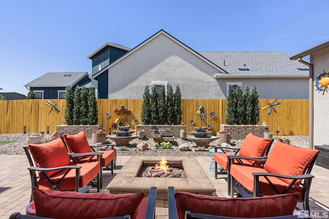 view of terrace featuring a fire pit