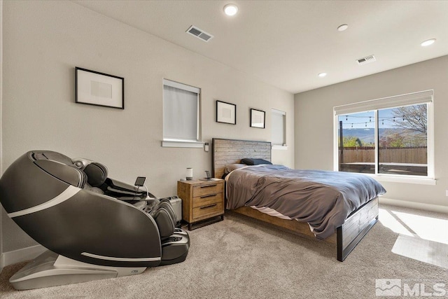 bedroom with light carpet