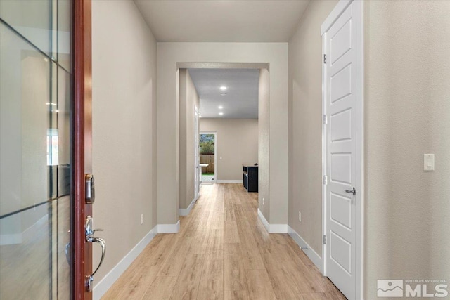 corridor featuring light wood-type flooring