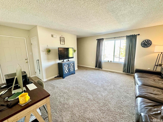 carpeted living room featuring a textured ceiling