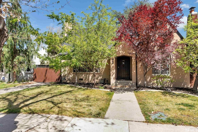 view of front of home with a front yard