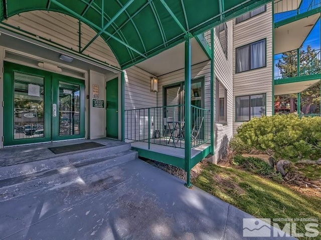 entrance to property with covered porch