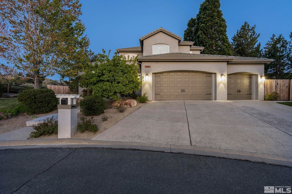 view of front of property with a garage