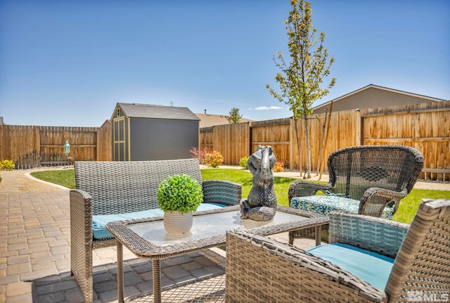 view of patio / terrace featuring a storage unit