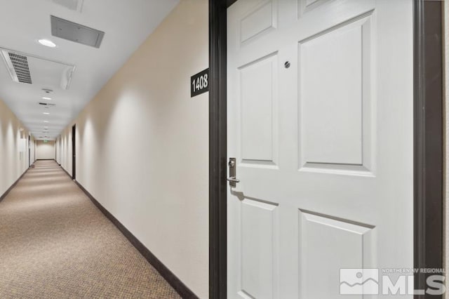 corridor with carpet floors