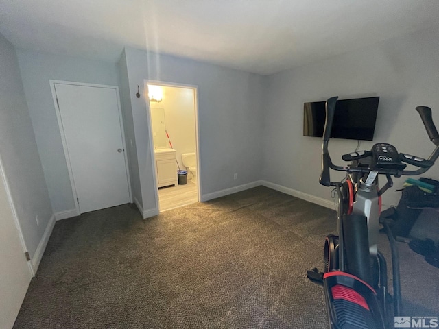 workout room featuring carpet floors