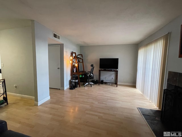 living room featuring light wood-type flooring