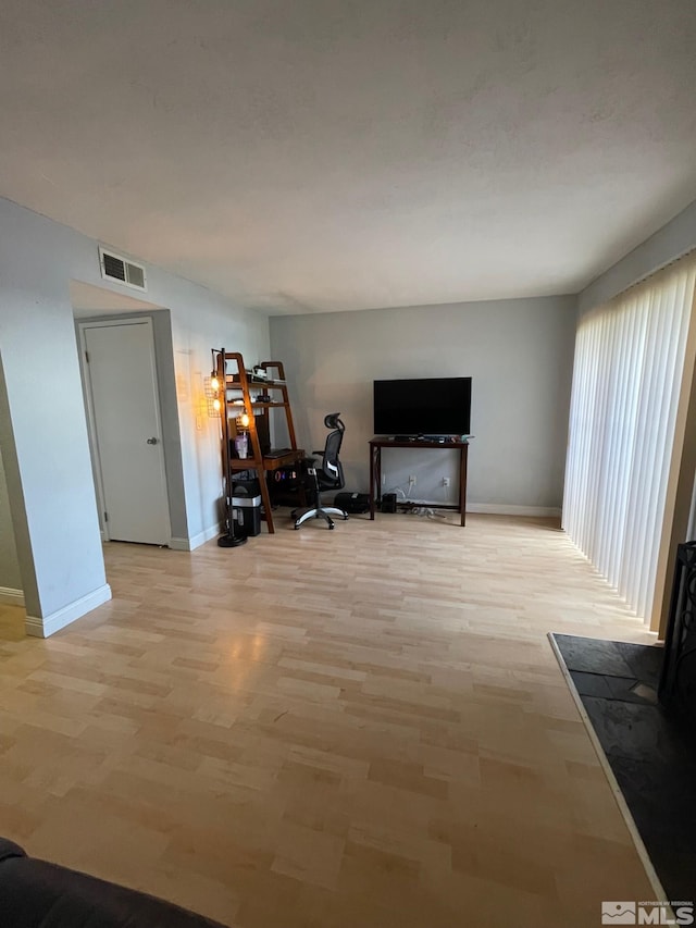 living room with hardwood / wood-style flooring