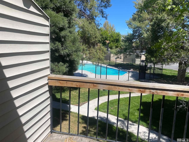 exterior space featuring a fenced in pool