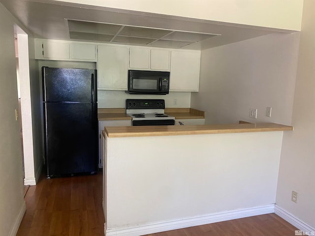 kitchen featuring white cabinetry, kitchen peninsula, dark wood-type flooring, and black appliances