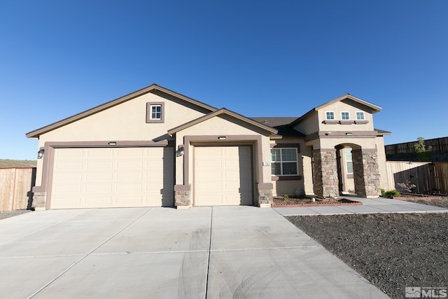 single story home with a garage