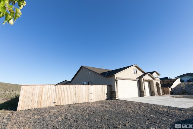 view of home's exterior featuring a garage