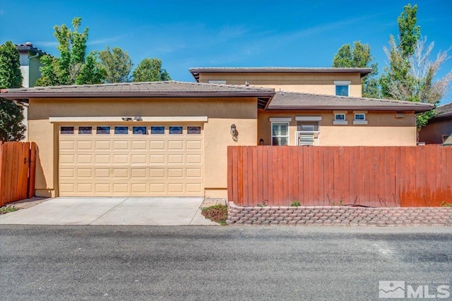 prairie-style home with a garage