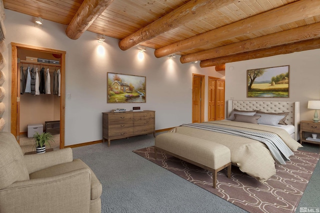 carpeted bedroom featuring beamed ceiling and wood ceiling