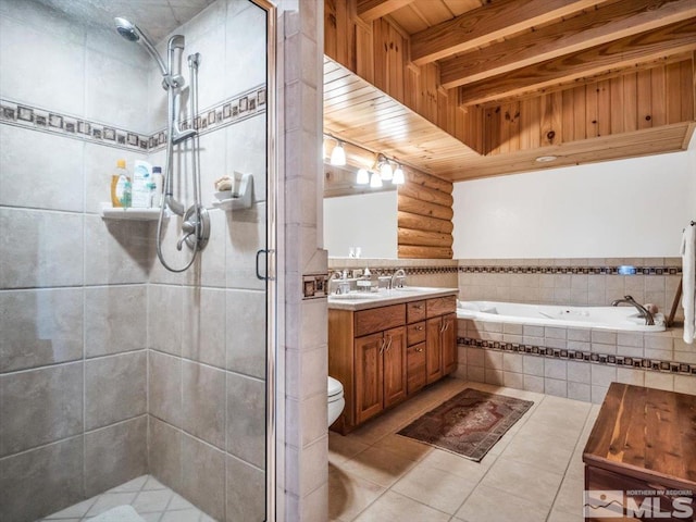 full bathroom featuring tile flooring, plus walk in shower, beamed ceiling, vanity, and toilet