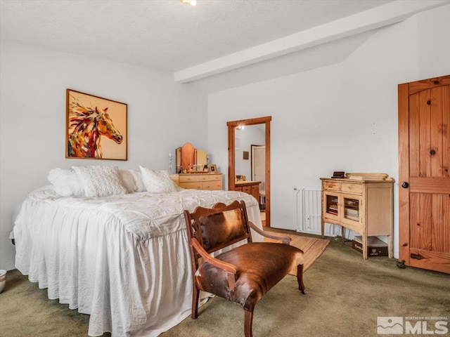 bedroom featuring carpet and beam ceiling