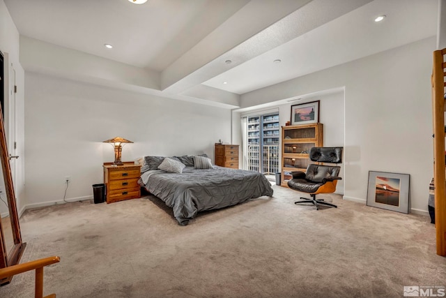 carpeted bedroom with access to outside