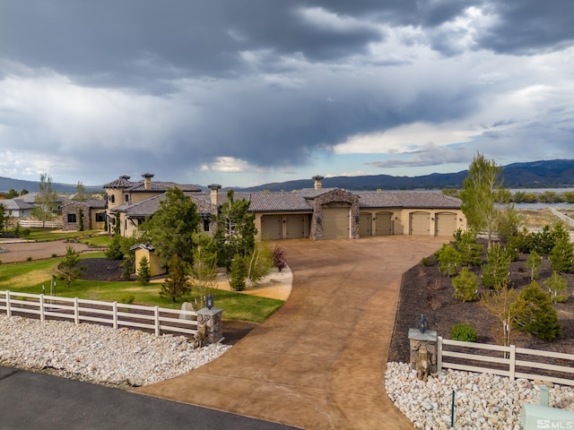 ranch-style house featuring a garage