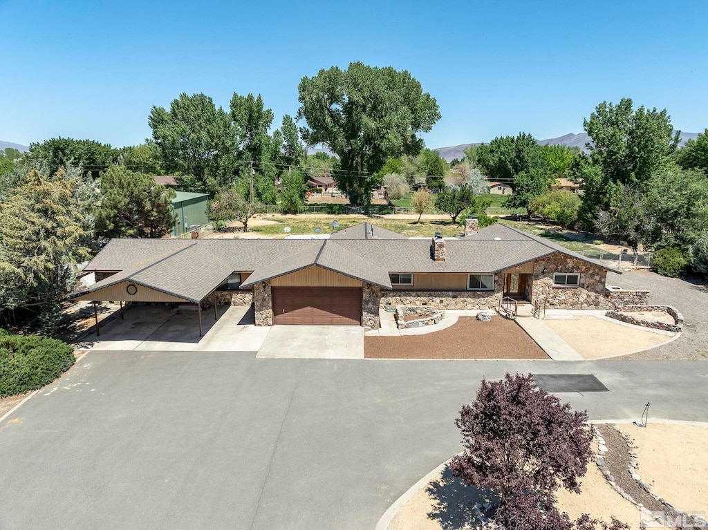 ranch-style house featuring a garage