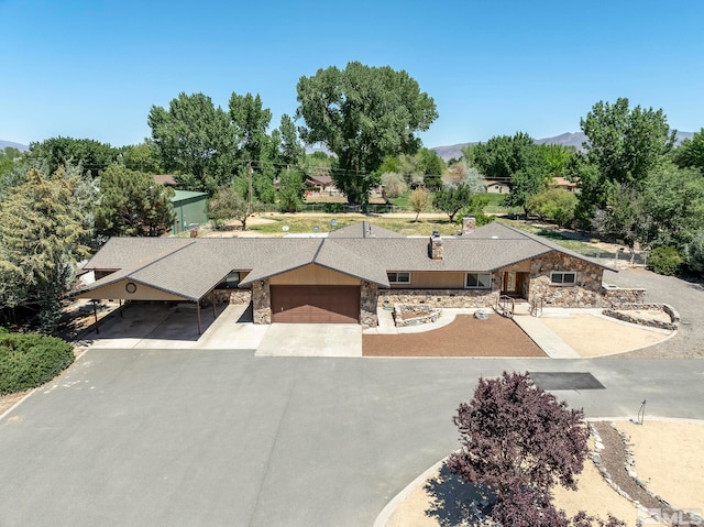 ranch-style house featuring a garage