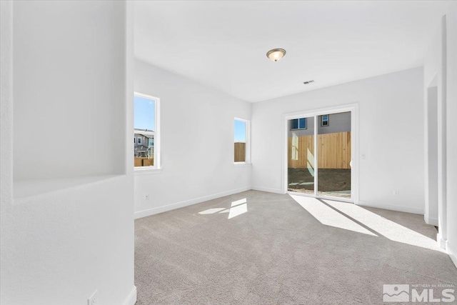 view of carpeted spare room