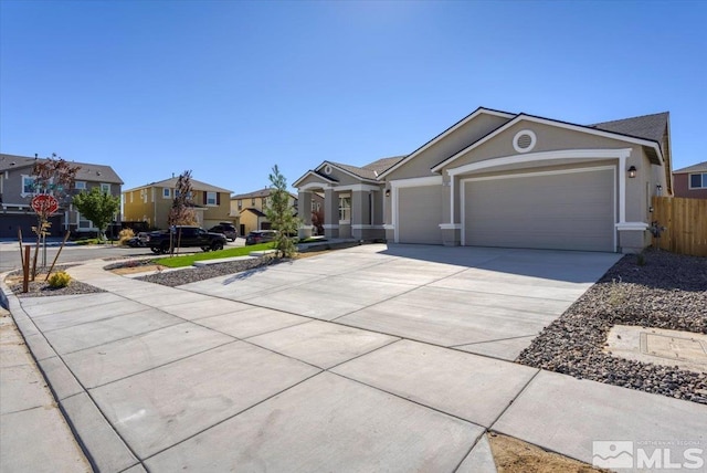 single story home featuring a garage