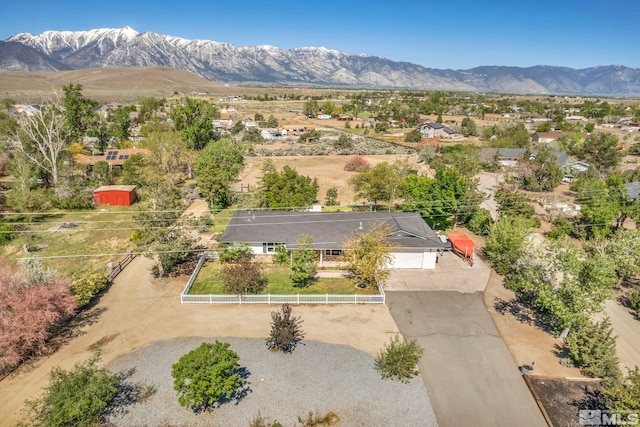 drone / aerial view featuring a mountain view