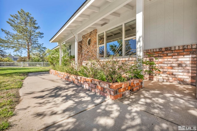 view of home's exterior featuring covered porch