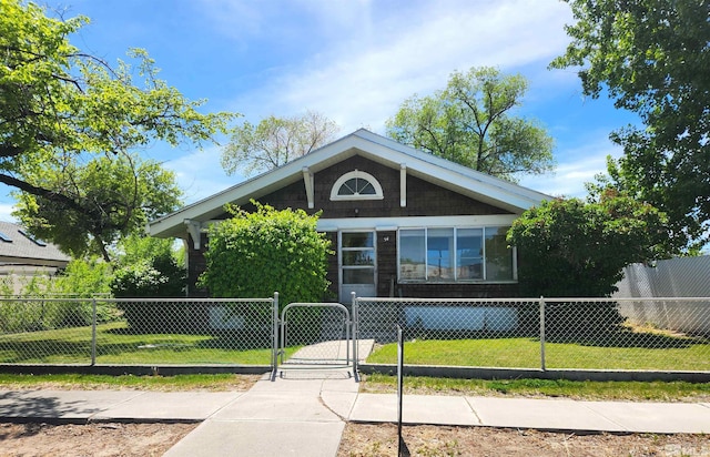 view of front of property with a front lawn