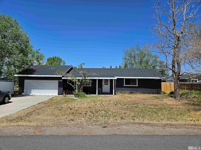 ranch-style home featuring a garage