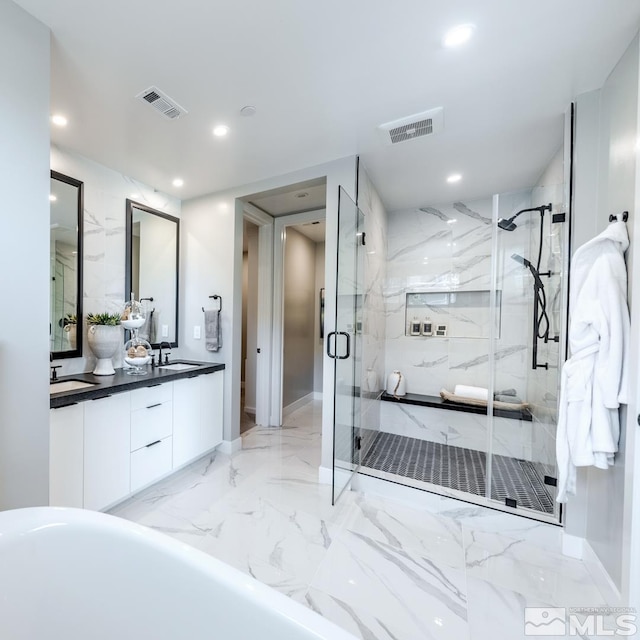 bathroom featuring tile floors, double vanity, and separate shower and tub