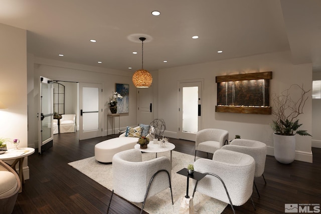 living room featuring dark wood-type flooring