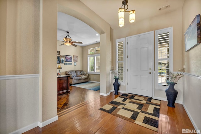 entrance foyer with wood-type flooring and ceiling fan