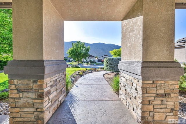 view of terrace featuring a mountain view