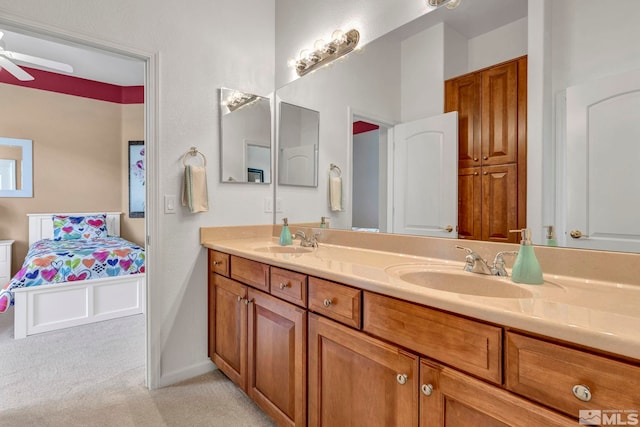 bathroom with dual bowl vanity and ceiling fan