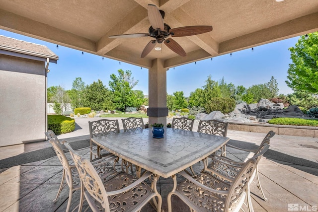 view of patio / terrace featuring ceiling fan