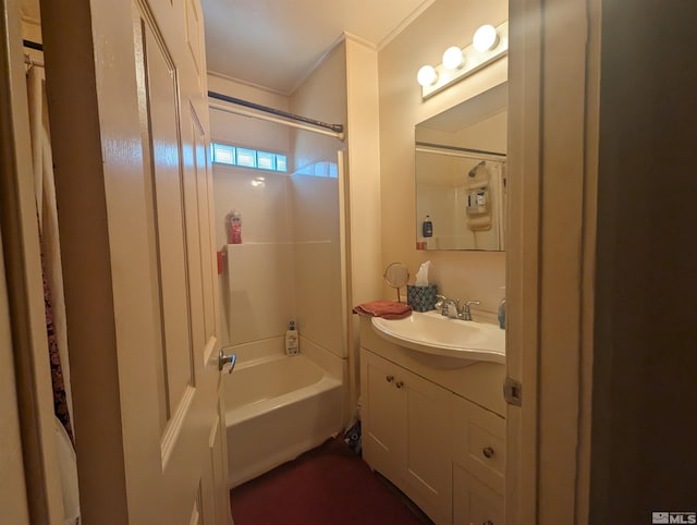 bathroom featuring vanity, shower / bath combo, and crown molding