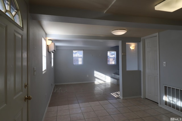 empty room with light tile floors