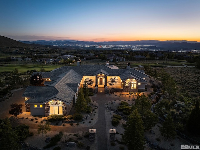 aerial view at dusk with a mountain view