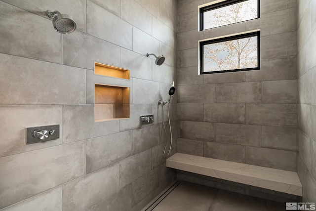 bathroom featuring tiled shower