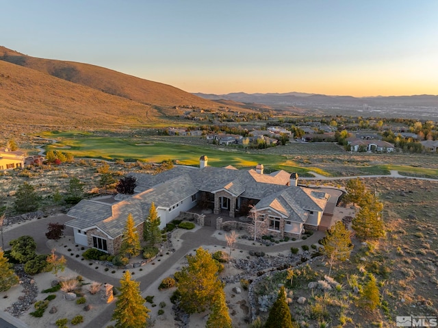 aerial view at dusk with a mountain view