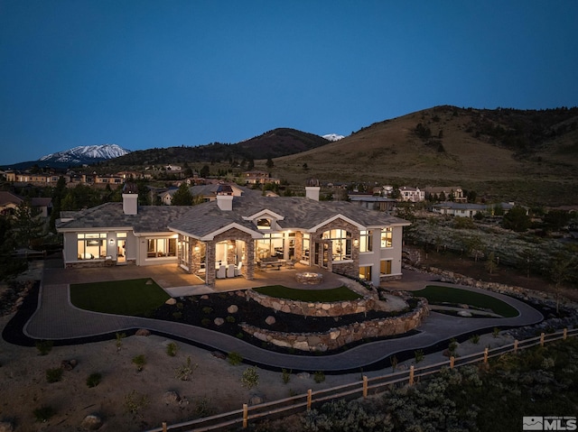 exterior space featuring a mountain view