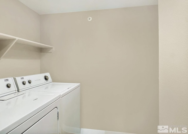 washroom with washer and clothes dryer