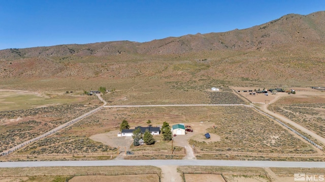 aerial view featuring a mountain view and a rural view